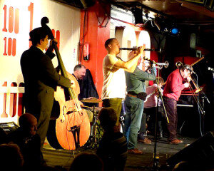 The Band: Ben Martyn (bass), Emile Martyn (dms), Adrian Cox (clt); Ged Hone (tmp), Mike Pointon (tmb), Tony Pitt (bjo); Ray Smith (pno)