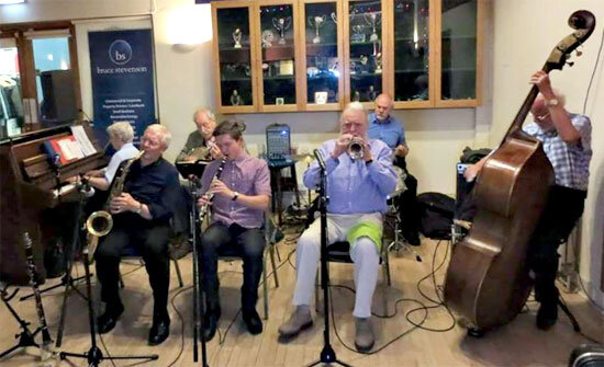 Reece at The Edinburgh Jazz ’n Jive Club with Vi Mills’ “The Spirits of Rhythm”. Vi on piano, Ian on reeds, Jim Petrie on cornet, Kenny Milne on drums, Dizzy Jackson on bass, Brian Weld on banjo and, yes, me sitting in on clarinet!